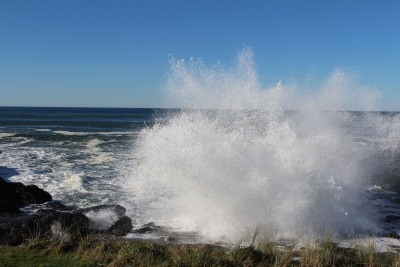 Dramatic wave action directly behind the house.