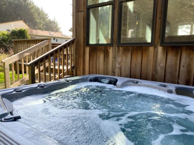 Hot tub off of the deck.