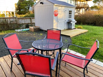 Patio Table and Chairs - Gas BBQ in background.