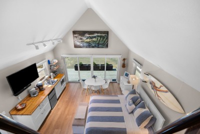 Looking down from loft at the Studio into the main room.