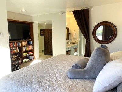 Master bedroom with adjoining bathroom suite